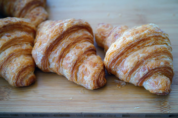 Freshly baked French croissants at a bakery