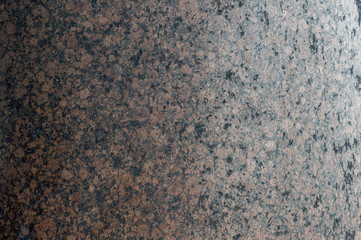 The texture of a granite column with a natural gradient of light brightness. Background