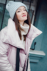 shopping, street fashion, style, people concept - model woman posing for photo outdoor. stylish...