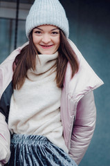 shopping, street fashion, style, people concept - model woman posing for photo outdoor. stylish...