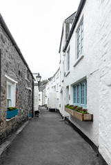 White Holiday Cottages and narrow streets in the Historic Polperro , Cornwall, UK