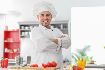 Portrait of male chef in kitchen