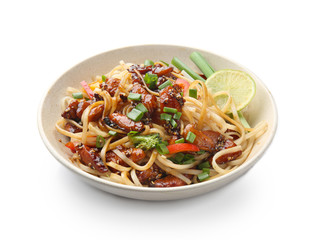 Plate with tasty chinese noodles on white background