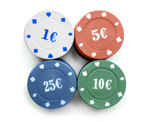 Chips for poker game on white background