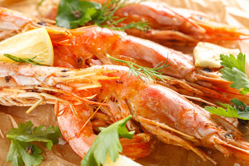 Grilled shrimps with spice, garlic and lemon. Grilled seafood. closeup