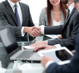 handshake partners at the Desk