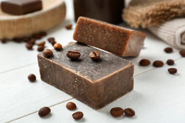 Natural handmade soap with coffee on wooden table
