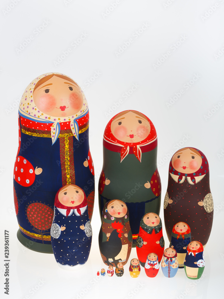 Wall mural Set of Russian dolls babushka matryoshka isolated on white