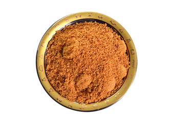 Coconut sugar, also known as coco sugar, coconut palm sugar, coco sap sugar or coconut blossom. Isolated on white background