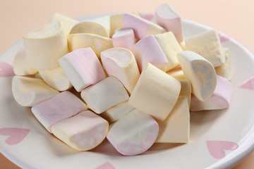 Plate with tasty marshmallow, closeup