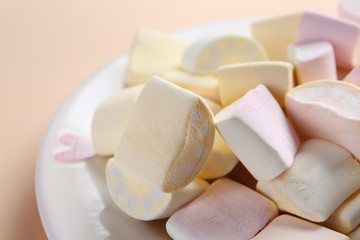 Plate with tasty marshmallow, closeup