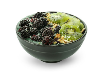 Bowl with spirulina smoothie on white background