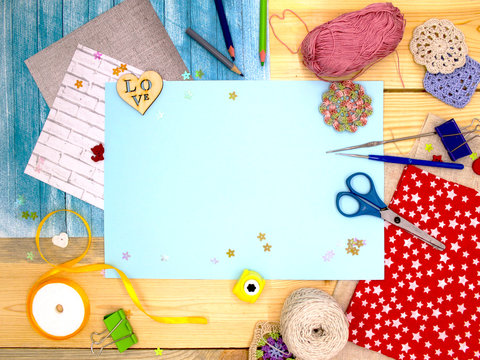 Materials and tools for needlework. Concept of handmade hobby. Bright accessories. Free space for your text.