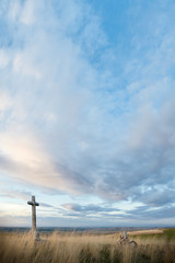 Crossings of stone representative of the Holy Week with background at dusk.