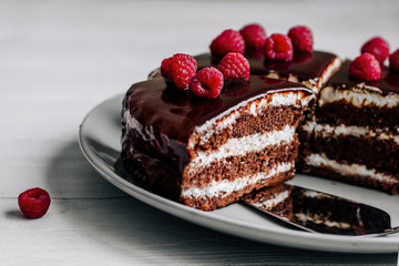 Chocolate cake decorated with raspberries