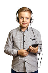 boy listens to music in headphones and holds a mobile phone, isolate on white background