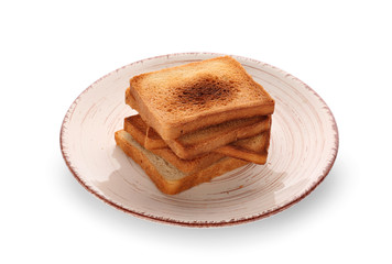 Plate with tasty toasted bread on white background