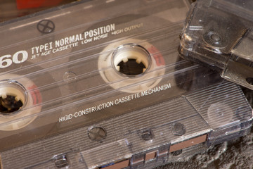 Old cassette tapes on the black table
