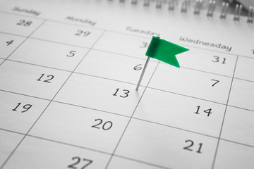 Calendar with pinned date, closeup