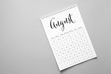 Calendar page of August on grey background