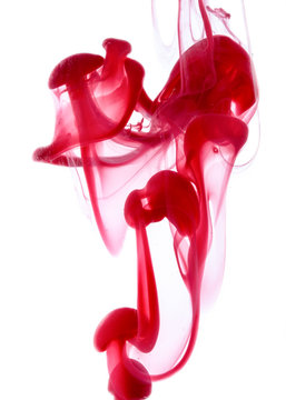 Water drop of red ink Abstract pattern falling into the