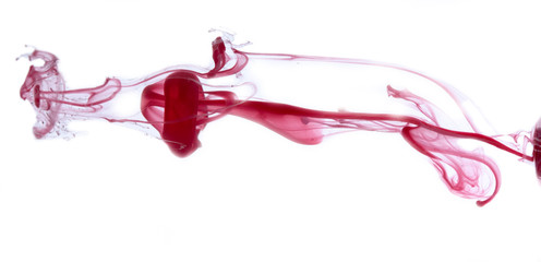 Water drop of red ink Abstract pattern falling into the