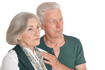 Close up portrait of senior couple isolated on white background