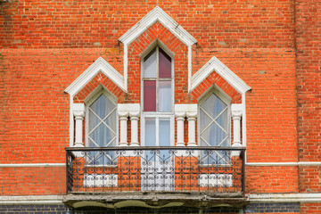 Sheremetev castle palace and park ensemble in the village of Yurino on the bank of the Volga, combination of different architectural styles in one building. Cloudy weather at the beginning of summer.
