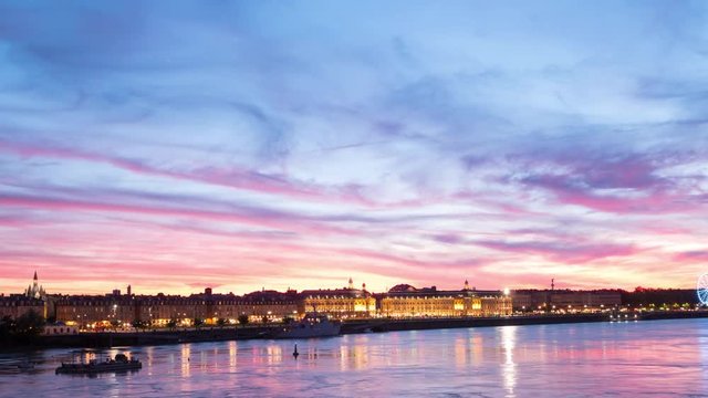 Beautiful panoramic view of Bordeaux skyline with dramatic sunset clouds on the sky.