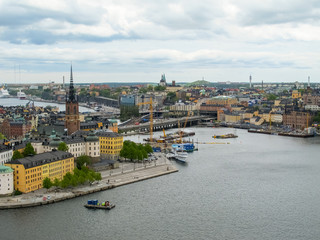 Fototapeta na wymiar Stockholm Sweden . Wonderful aerial panorama from observation deck on a modern city and Gamla Stan (Old Town)