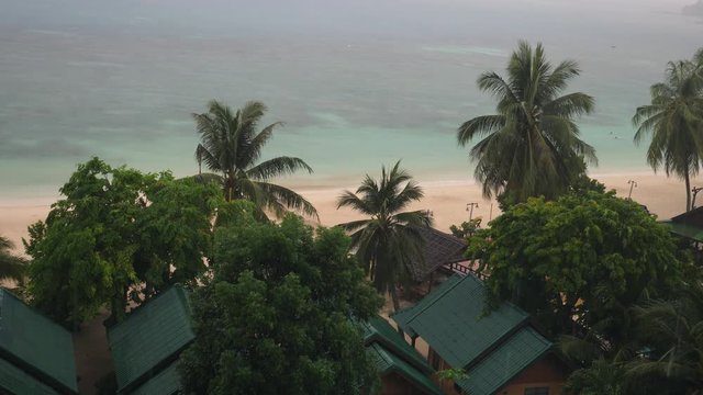 Rain Season On Tropical Island With Palm Trees And The Sea