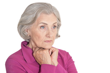 Sad senior woman  isolated on white background