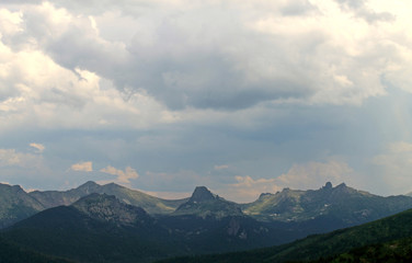 beautiful scenic clouds on mountain landscape Sayany