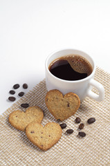 Heart-shaped cookies and a cup of coffee