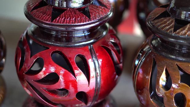 Handmade traditional craft known as 'labu sayong' normally used as gift or souvenir found in Perak,Malaysia. Clay pottery arts. Artistic clay container carving. UNGRADED.Panning Shot