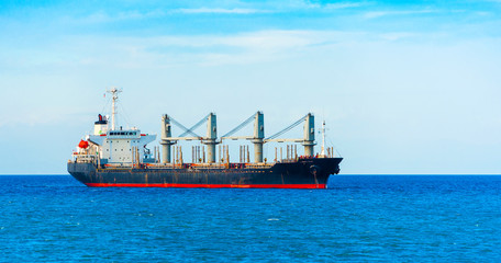 View of the cargo ship in the port of Cebu, Philippines. Copy space for text.