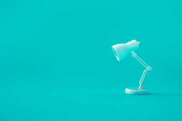 Idea and creativity concepts with lamp on pastel color background © hakinmhan
