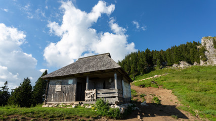 Fototapeta na wymiar Old mountain refuge in the middle of Romanian mountains