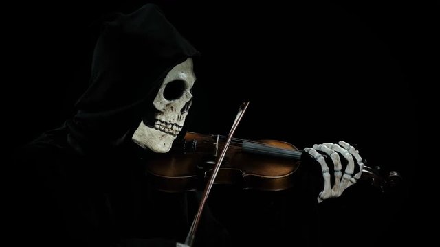 death plays the devil's violin, playing the melody of death