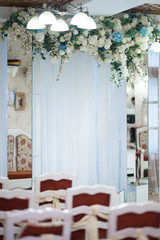Place for wedding ceremony in white color ,with white fireplace
