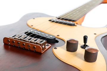 Fototapeta na wymiar Electric guitar on white background, closeup. Musical instrument