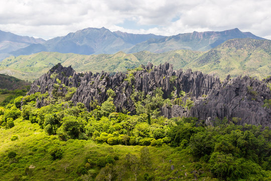 Sharp needles of black volcanic peaks. Mountains near Mont Aoupinie and Poya river, aerial view. North Province, New Caledonia, Micronesia, overseas territory of France, Oceania, South Pacific Ocean.