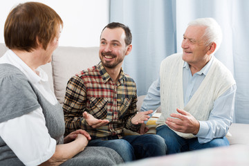 Grandparents and grandson talk