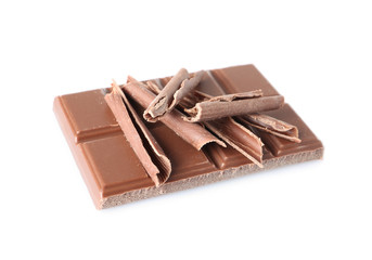 Chocolate curls and bar isolated on white