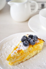 Pumpkin lemon cheesecake with fresh blueberries.