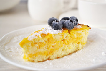 Pumpkin lemon cheesecake with fresh blueberries.