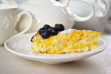 Pumpkin lemon cheesecake with fresh blueberries.