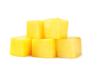Fresh juicy mango cubes isolated on white