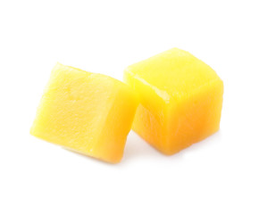 Fresh juicy mango cubes isolated on white