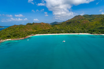 Fototapeta premium Aerial view of beautiful island at Seychelles in the Indian Ocean. Top view from drone